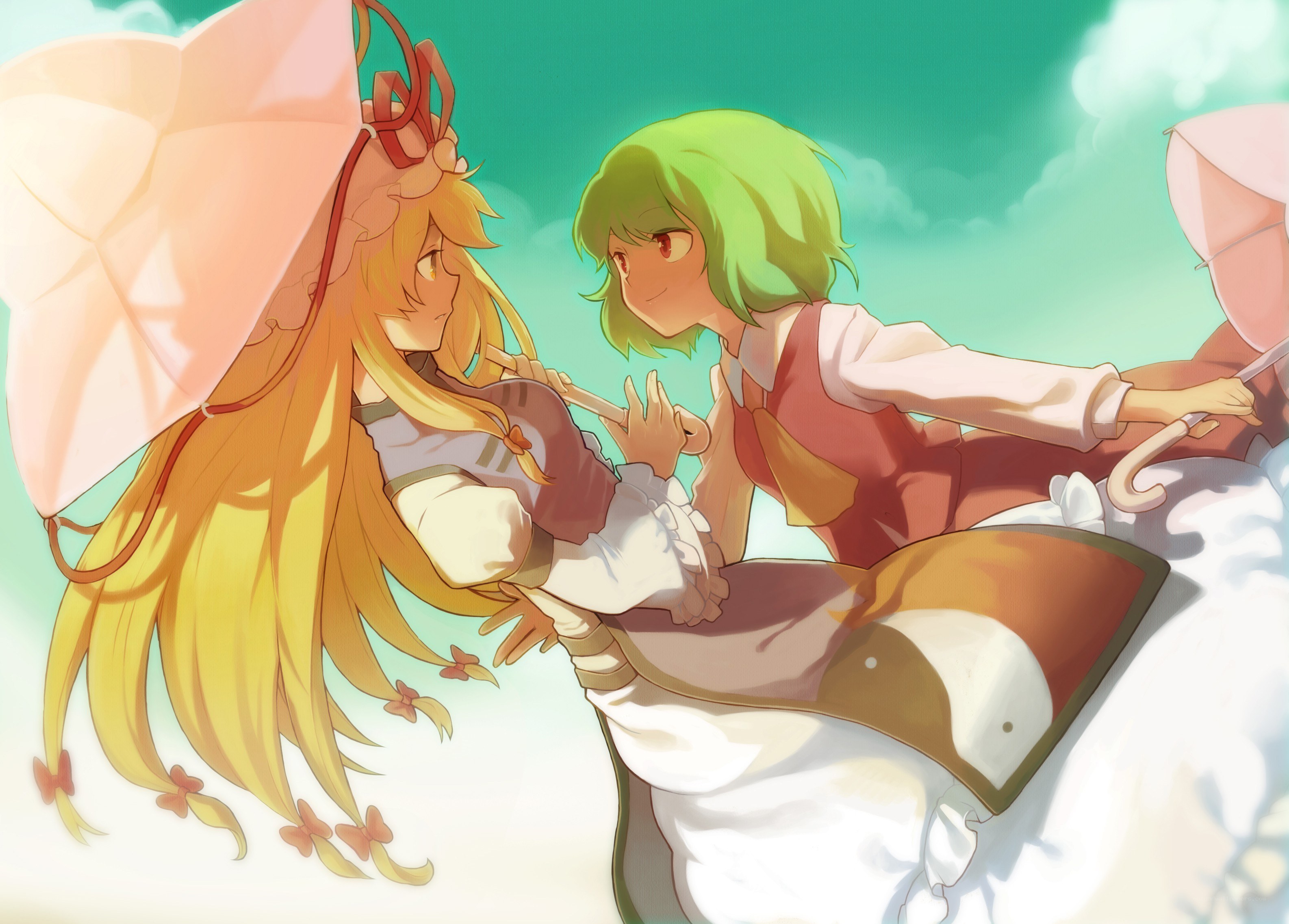 Two girls with umbrellas