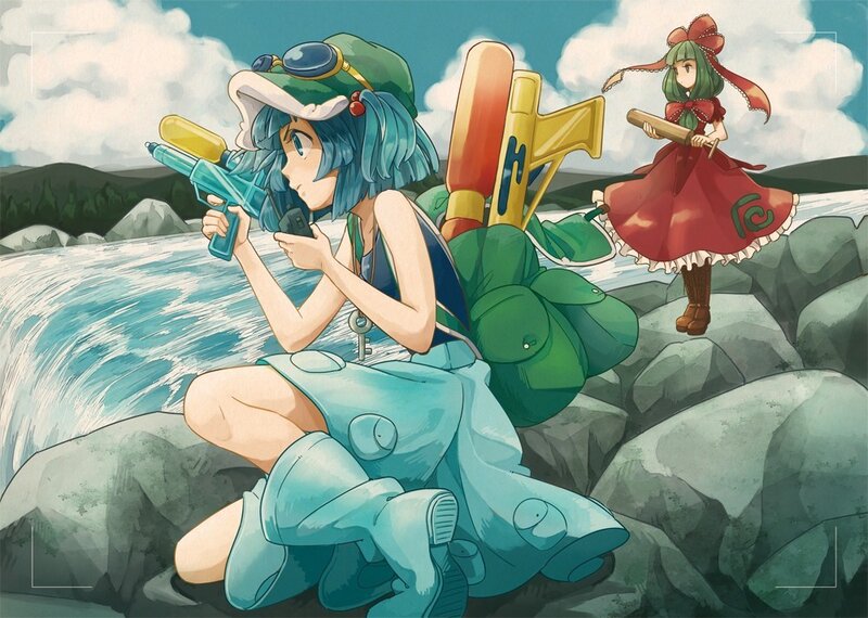 Two girls with water guns by a river