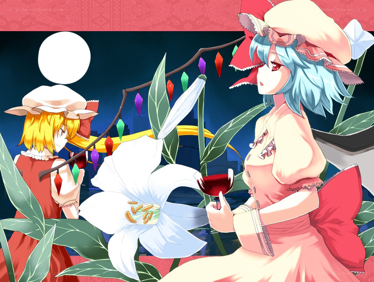 Two girls with wine glasses