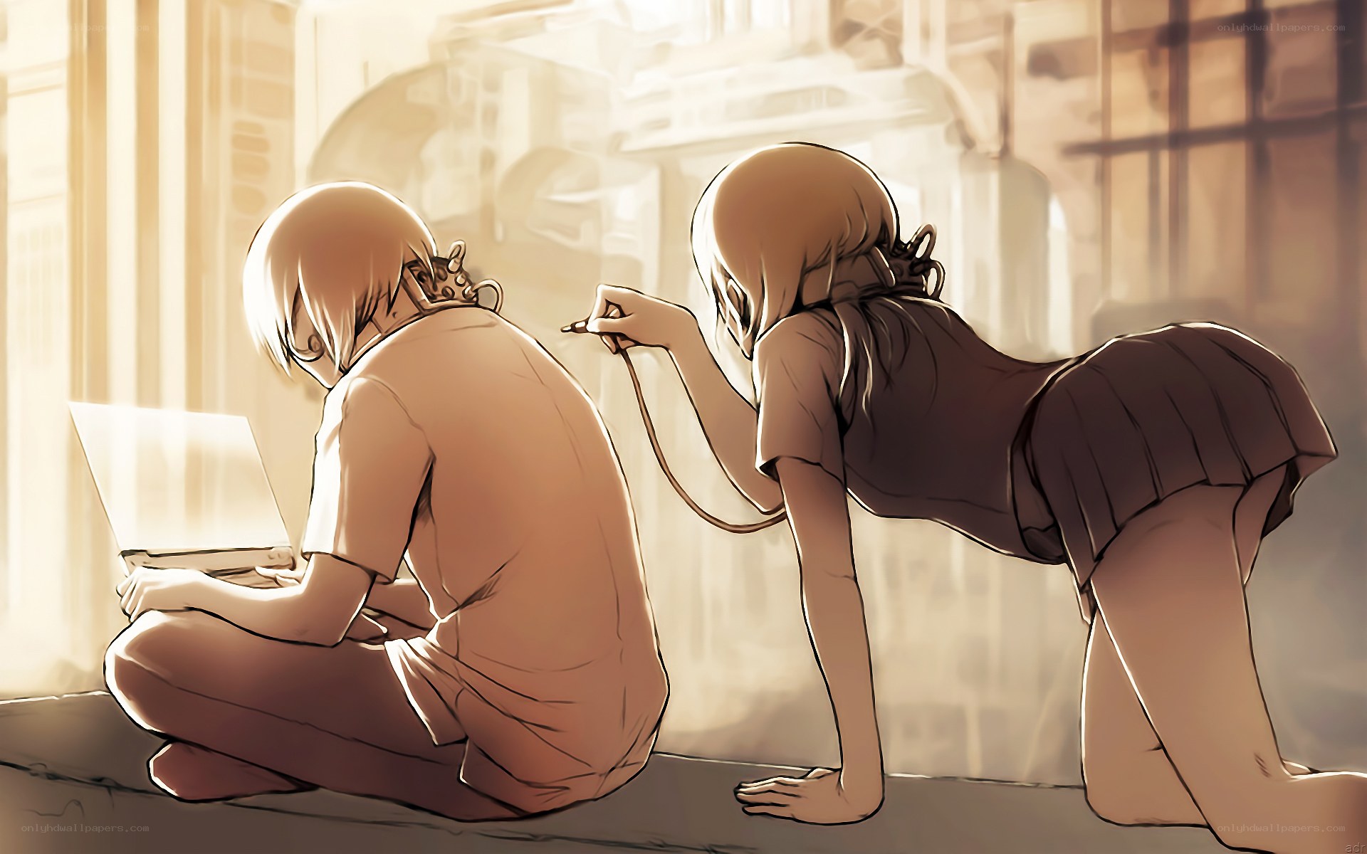 Two girls working on a laptop
