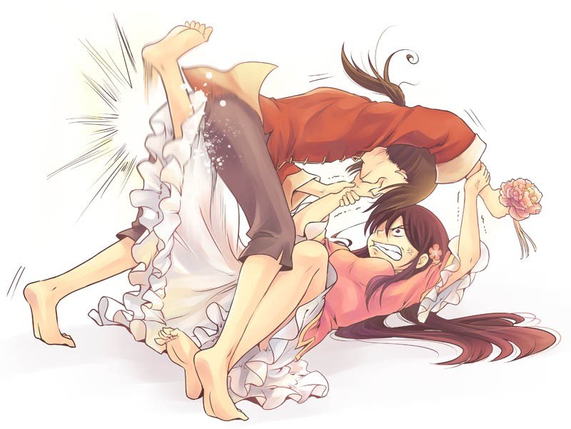 Two girls wrestling