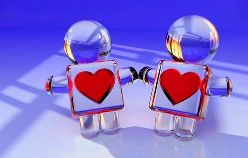 Two Glass Figures Holding Hands