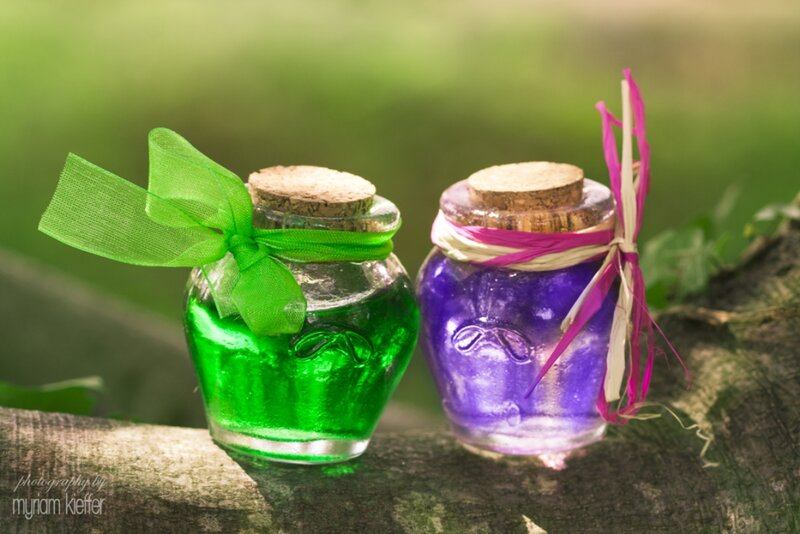 Two Glass Jars on Log