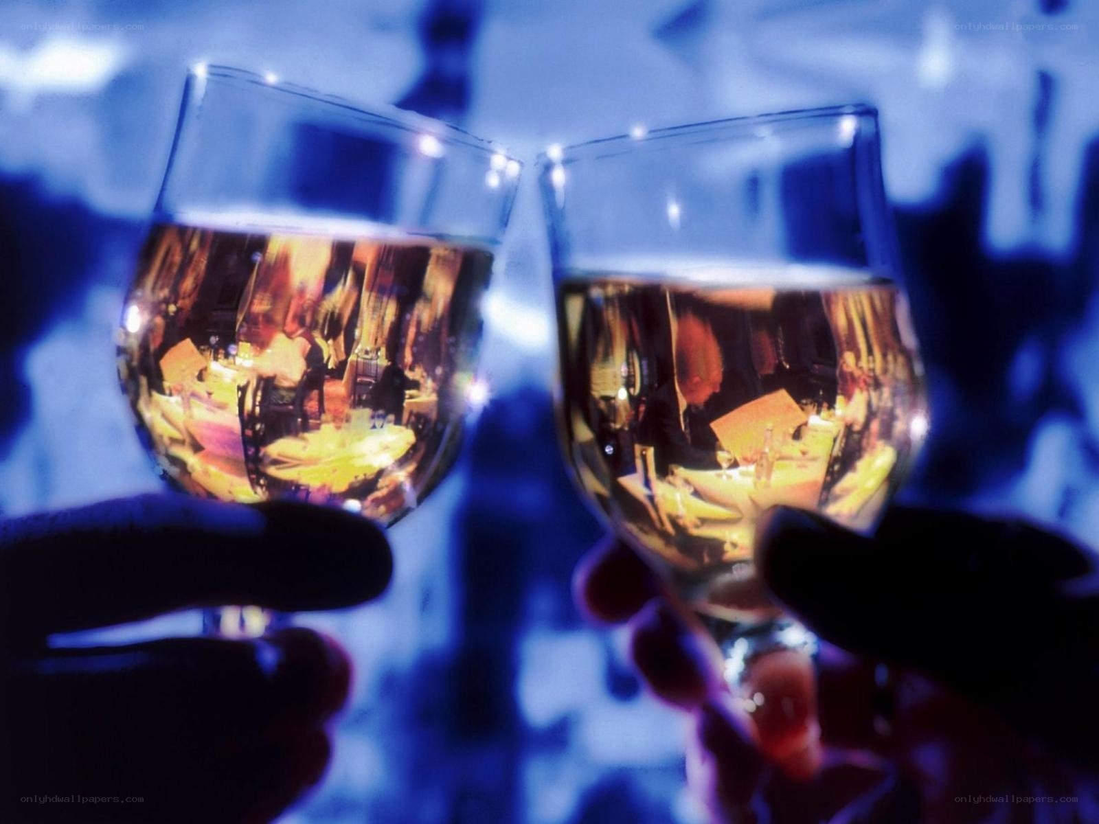 Two glasses clinking in celebration