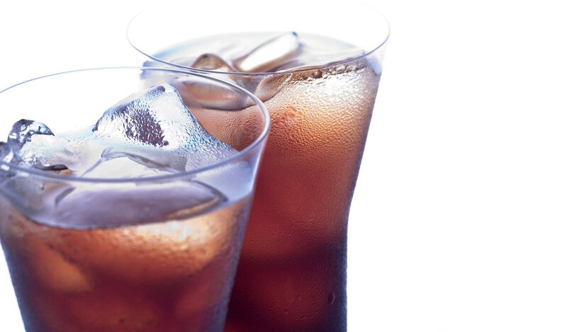 Two glasses of cola with ice