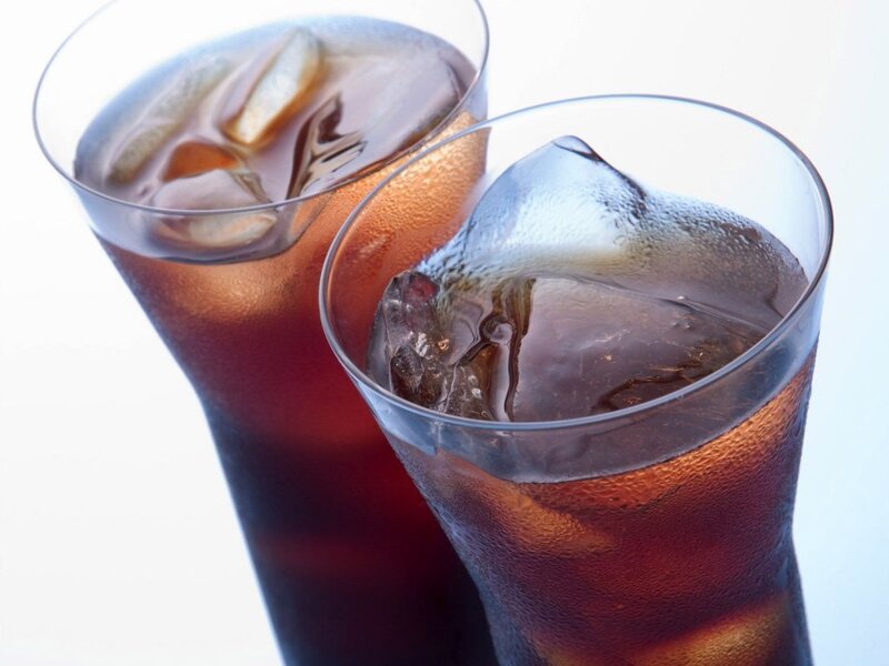 Two glasses of cola with ice