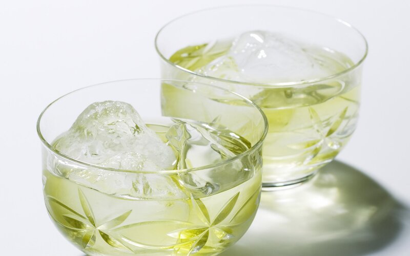 Two glasses of green tea with ice