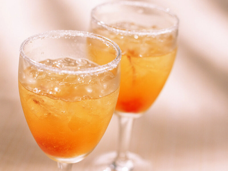 Two glasses of orange cocktail