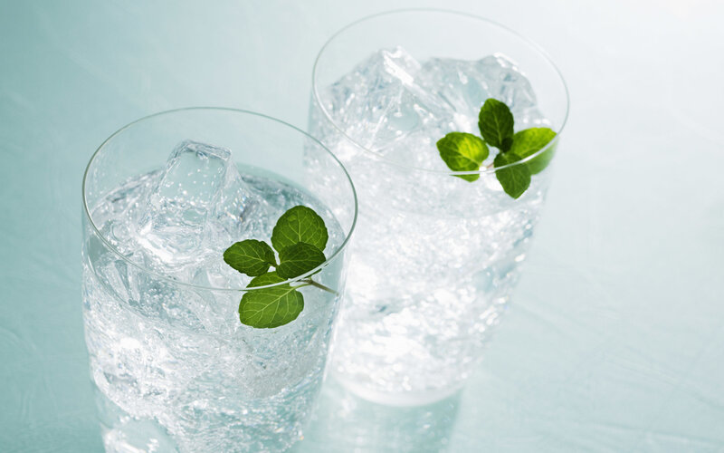 Two Glasses of Sparkling Water — White