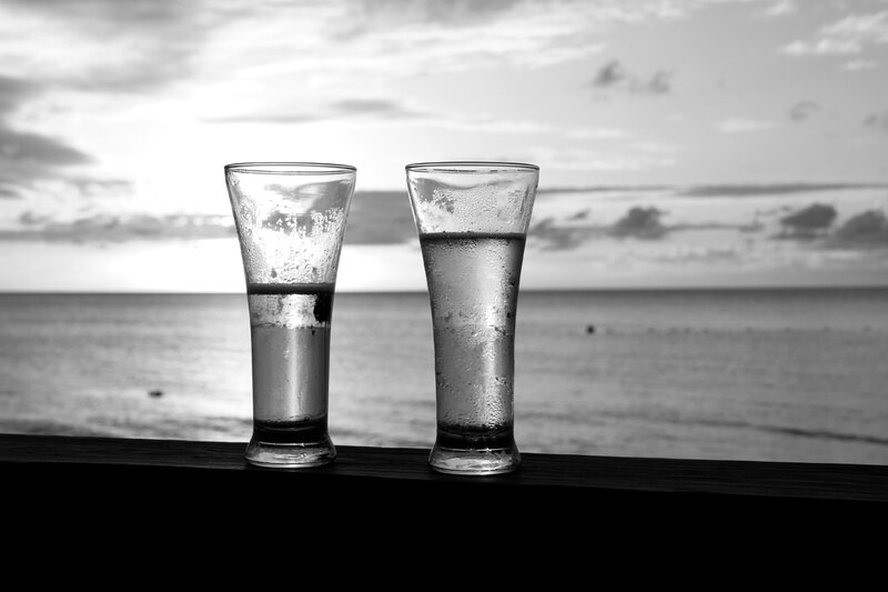 Two Glasses on Railing