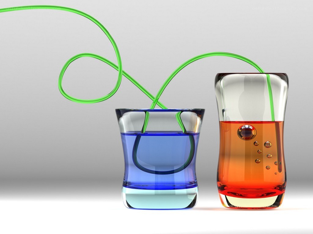 Two glasses with colored liquids