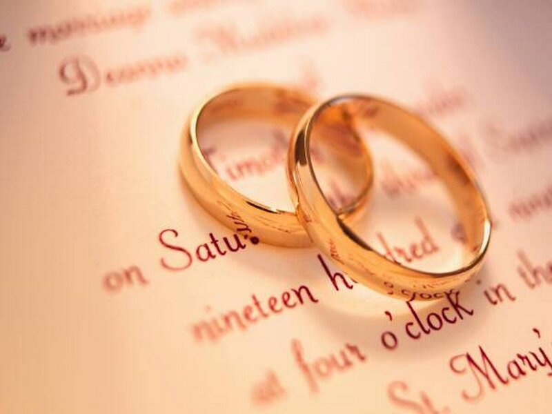 Two Gold Wedding Rings — Romantic