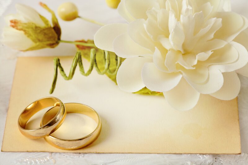 Two Gold Wedding Rings — White, Romantic