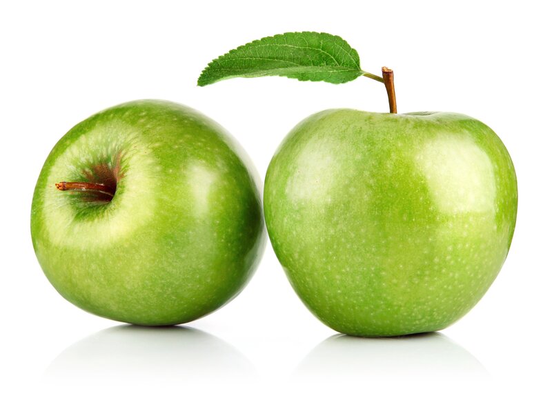 Two green apples with leaf