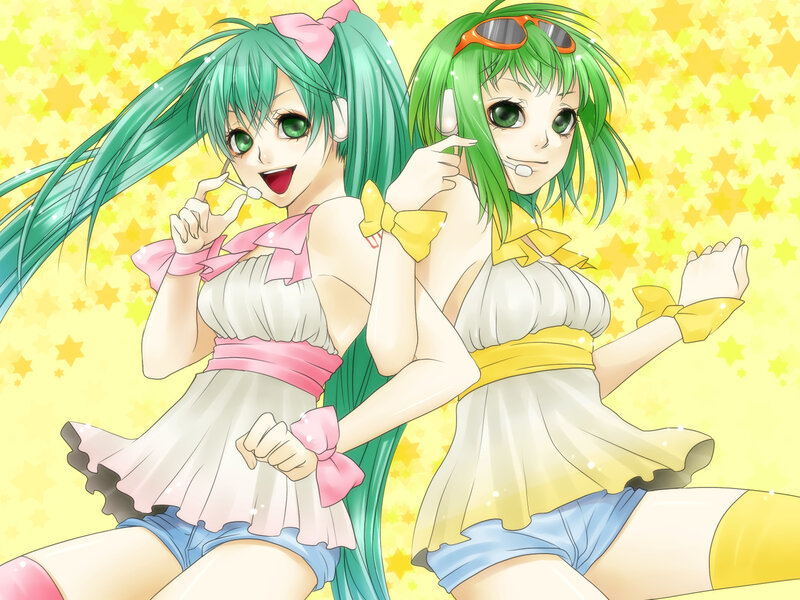 Two green-haired anime girls dancing