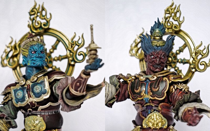 Two guardian deity figures
