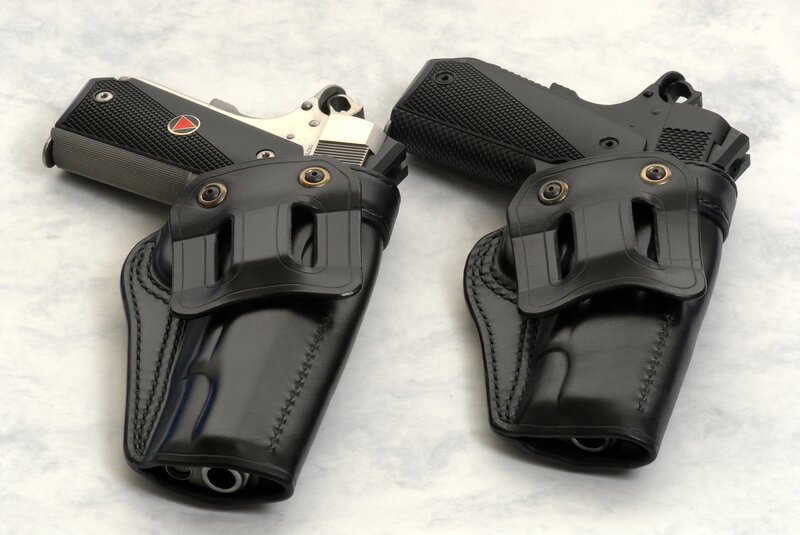 two handguns in holsters