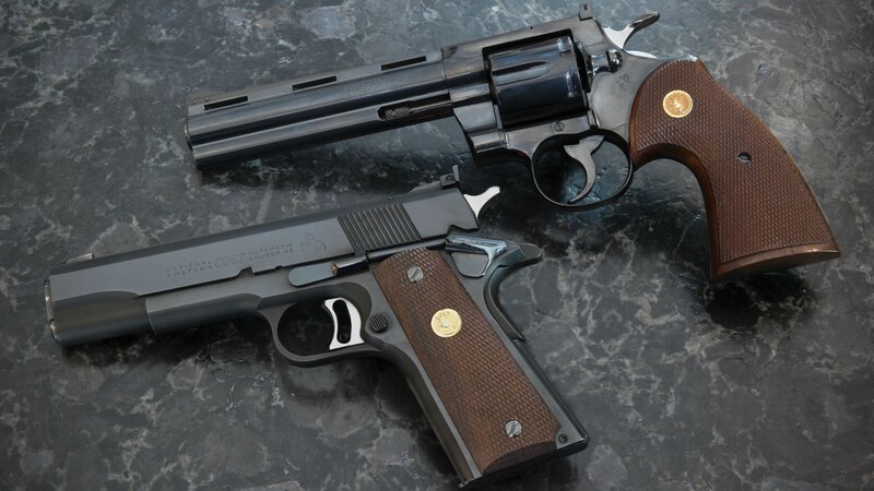 Two Handguns on Surface