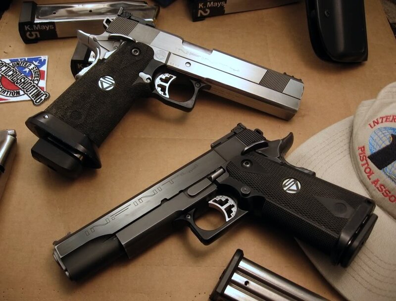 Two Handguns on Table