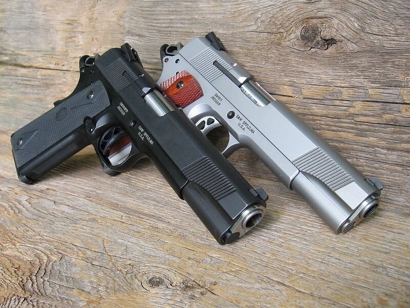 Two Handguns on Wood