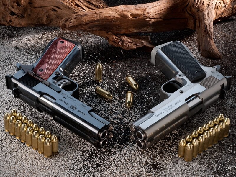 Two Handguns with Bullets