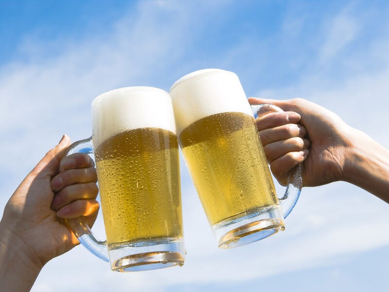 Two Hands Clinking Beer Mugs — Blue, Celebratory, Afternoon