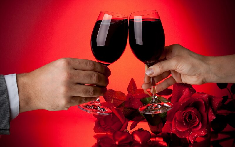 Two Hands Clinking Wine Glasses
