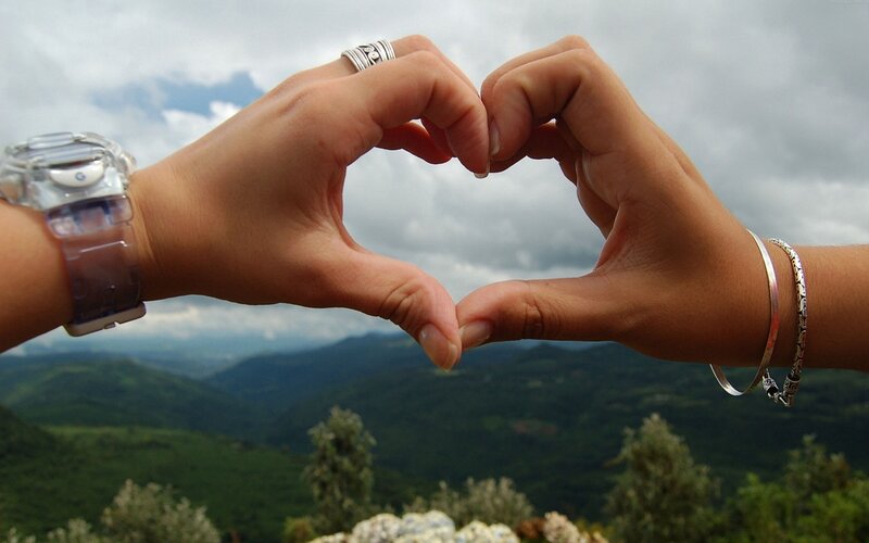 Two Hands Forming Heart