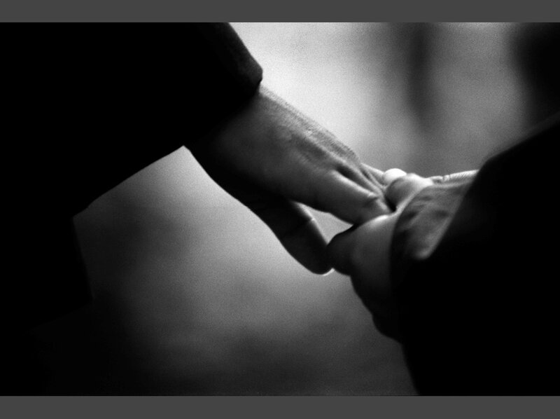 Two Hands Holding — Black, Dramatic