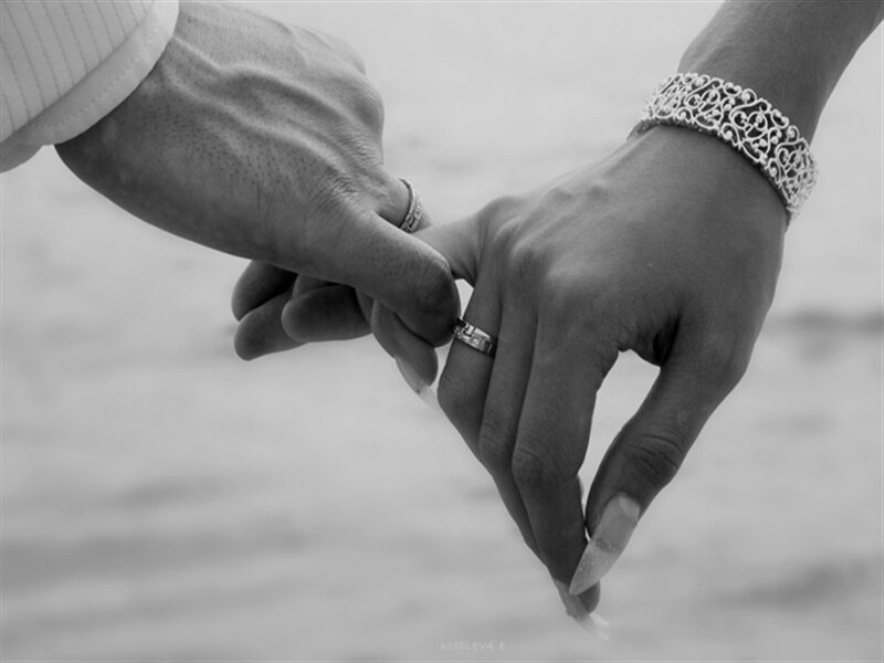 Two Hands Holding — Black, Intimate