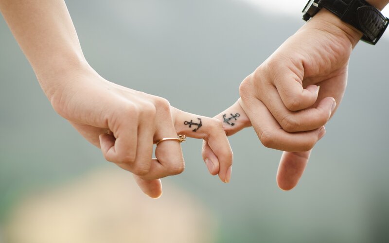 Two Hands Holding Fingers — White, Intimate