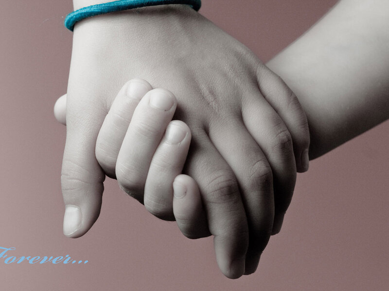 Two Hands Holding — Gray