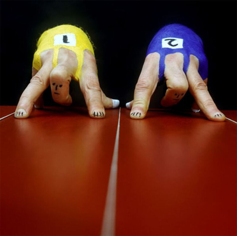 Two Hands in Wrestling Poses