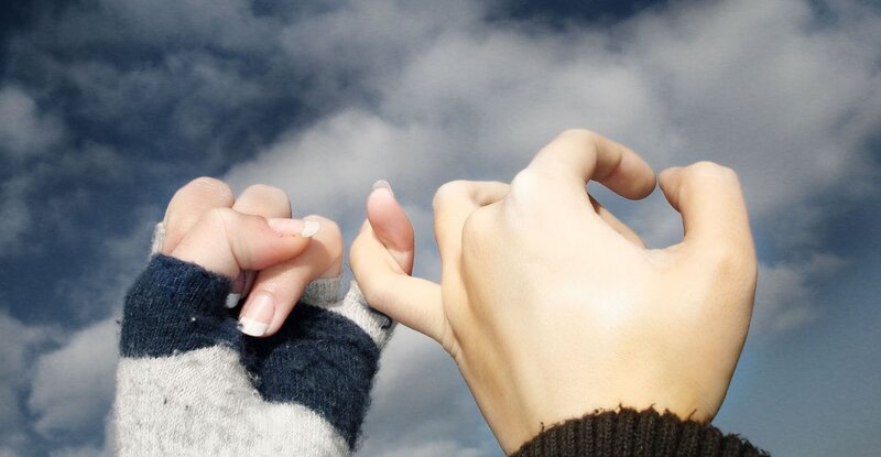 Two Hands Making Pinky Promise