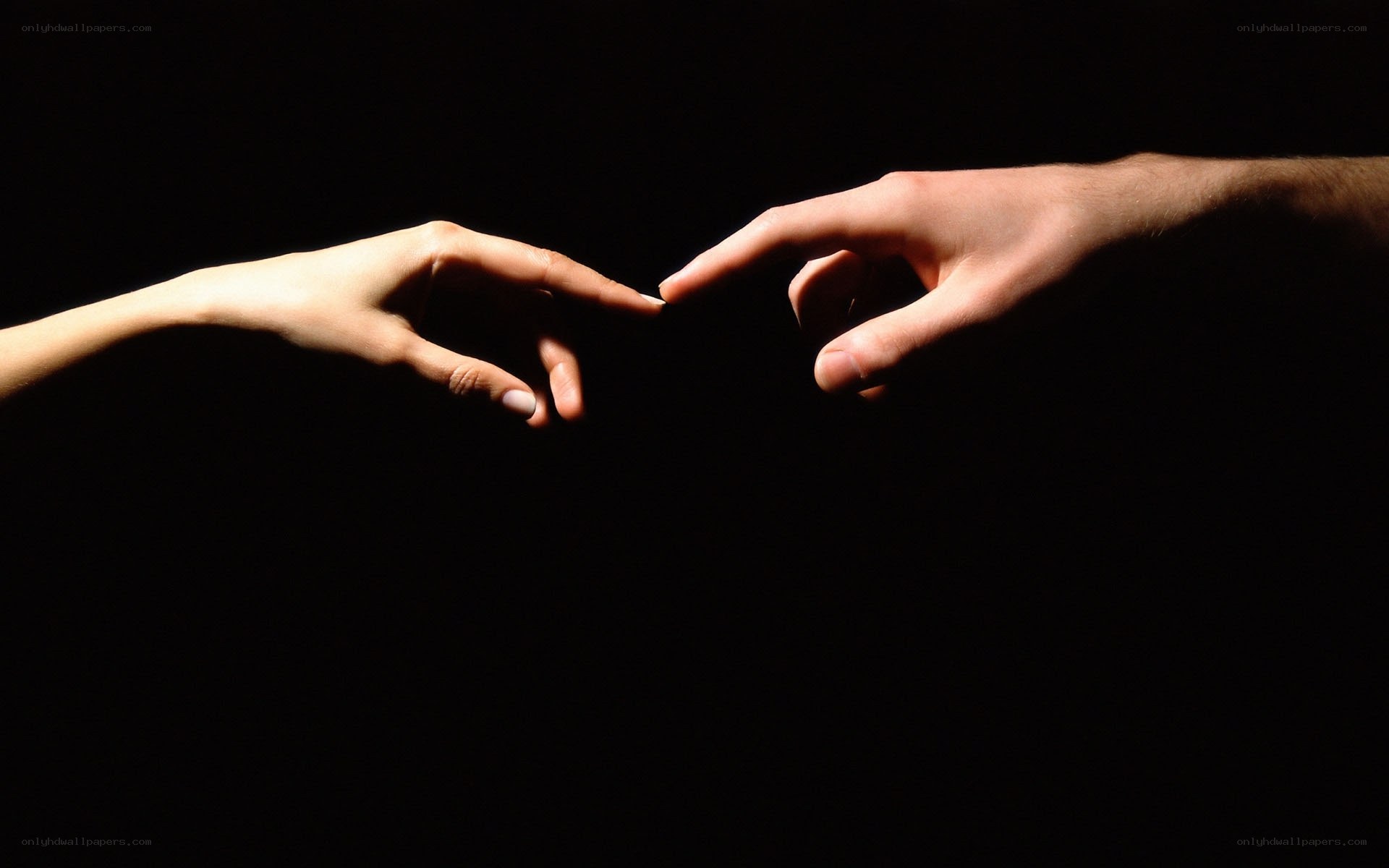 two hands reaching