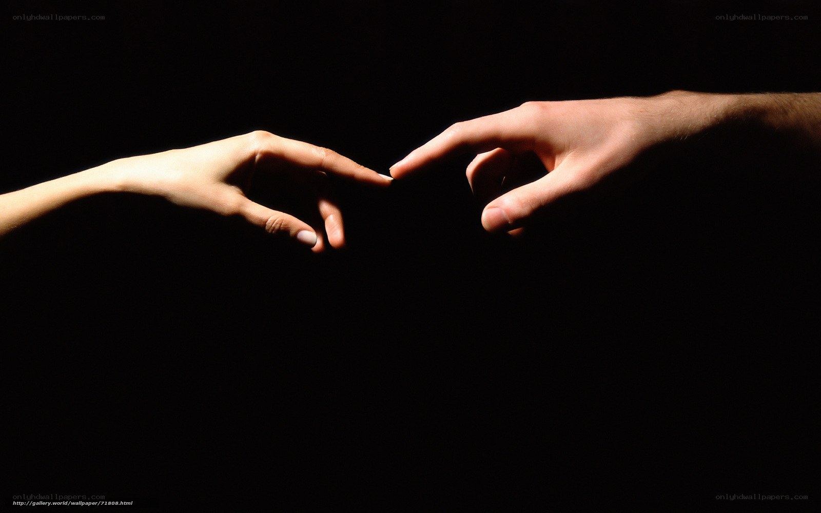 two hands reaching