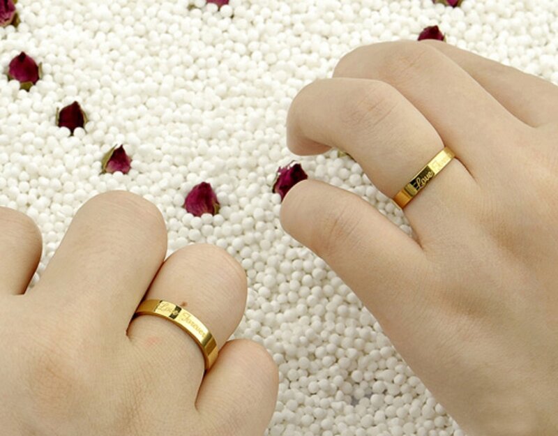 Two Hands with Rings