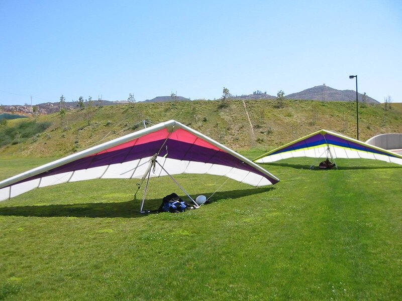 Two Hang Gliders on Grass