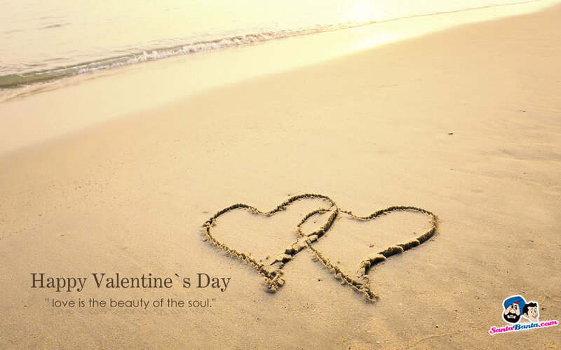 Two Hearts Drawn in Sand