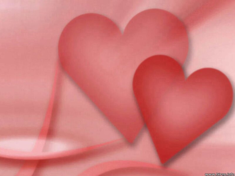 two hearts on pink background