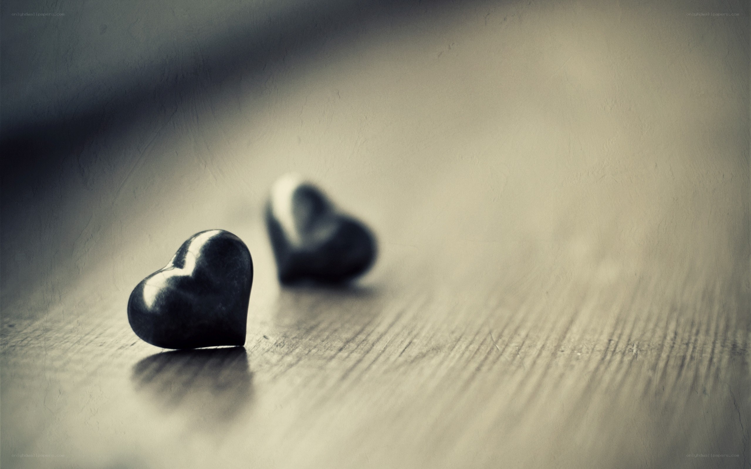 Two hearts on wood