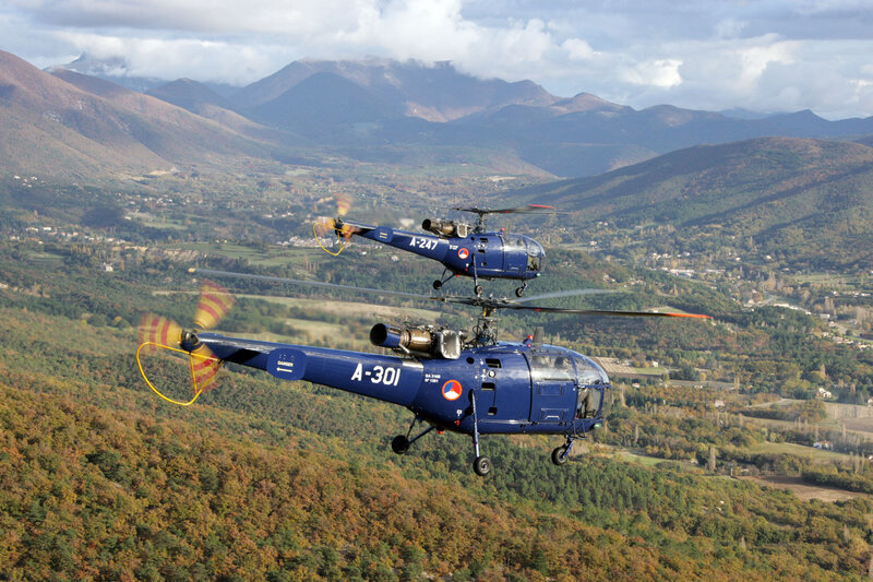 Two Helicopters Flying