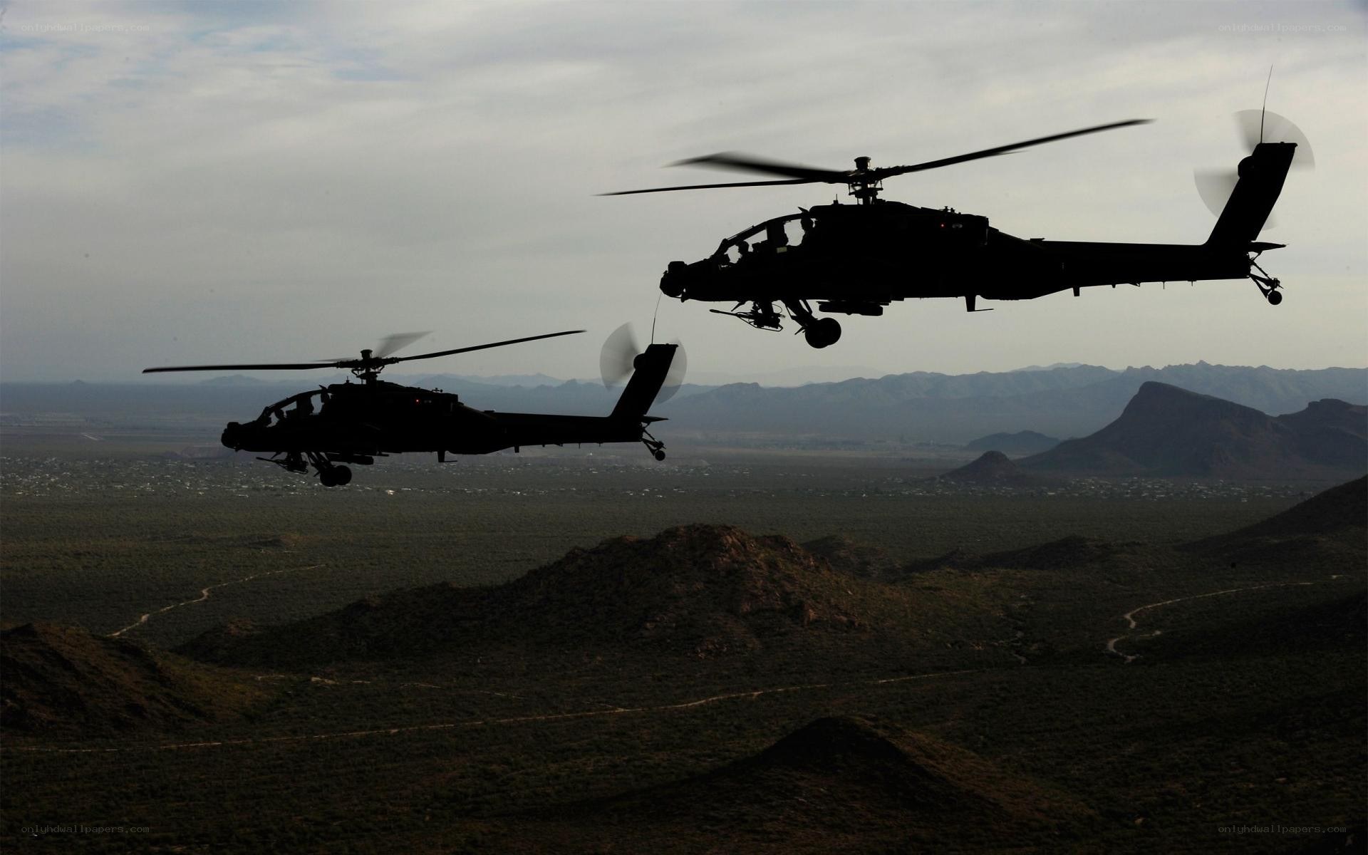 Two helicopters in flight