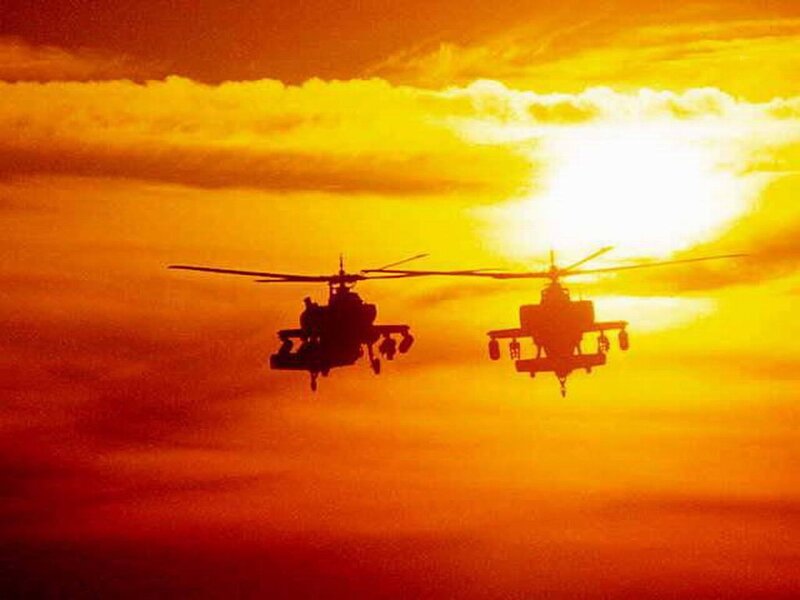 Two Helicopters in Flight — Orange