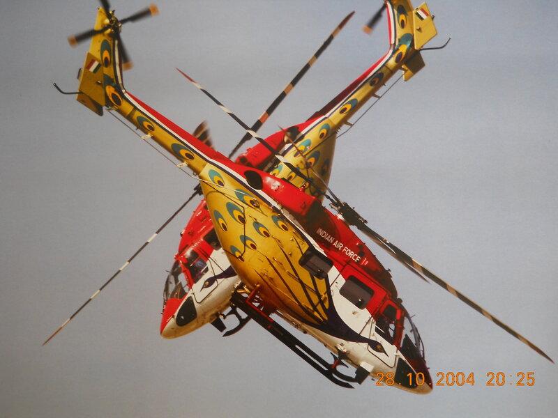 Two Helicopters in Flight — Yellow