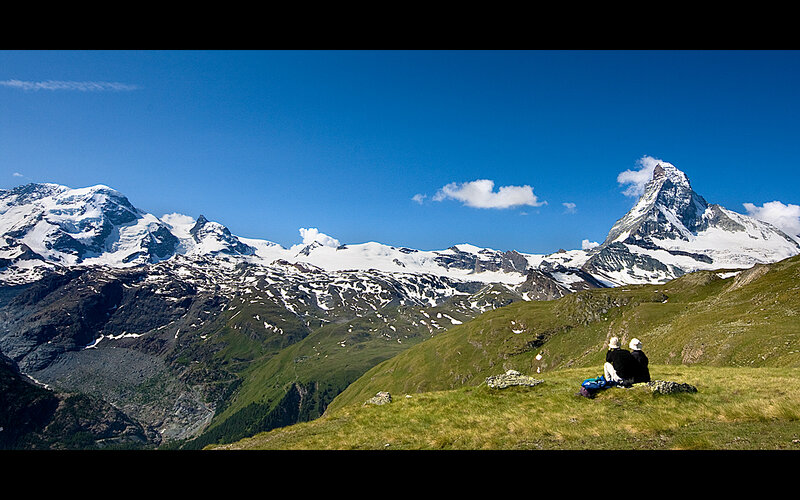 Two Hikers on a Mountain