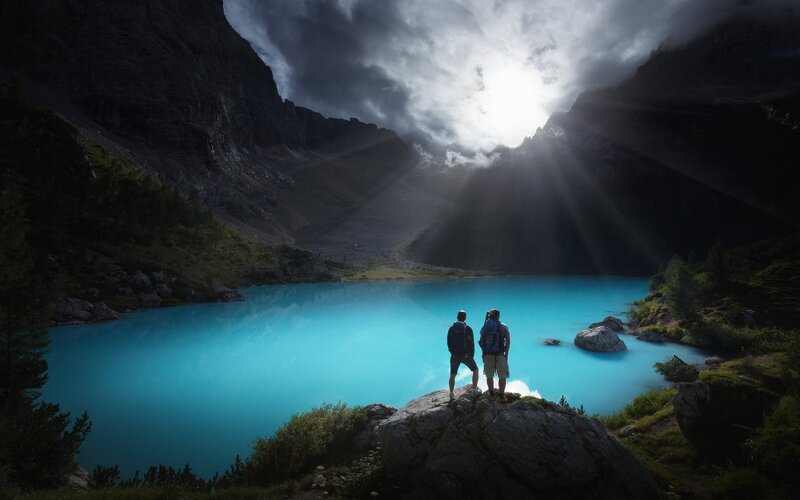 Two Hikers on a Rock
