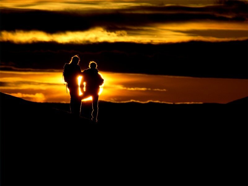 Two Hikers Silhouetted
