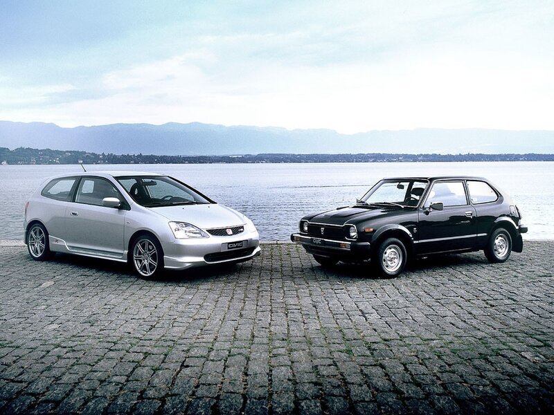 Two Honda Civics by the water