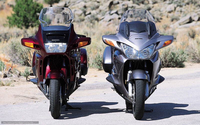 Two Honda motorcycles side by side